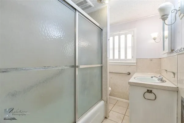 a utility room with a window dryer and washer