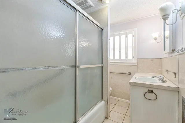 a utility room with a window dryer and washer