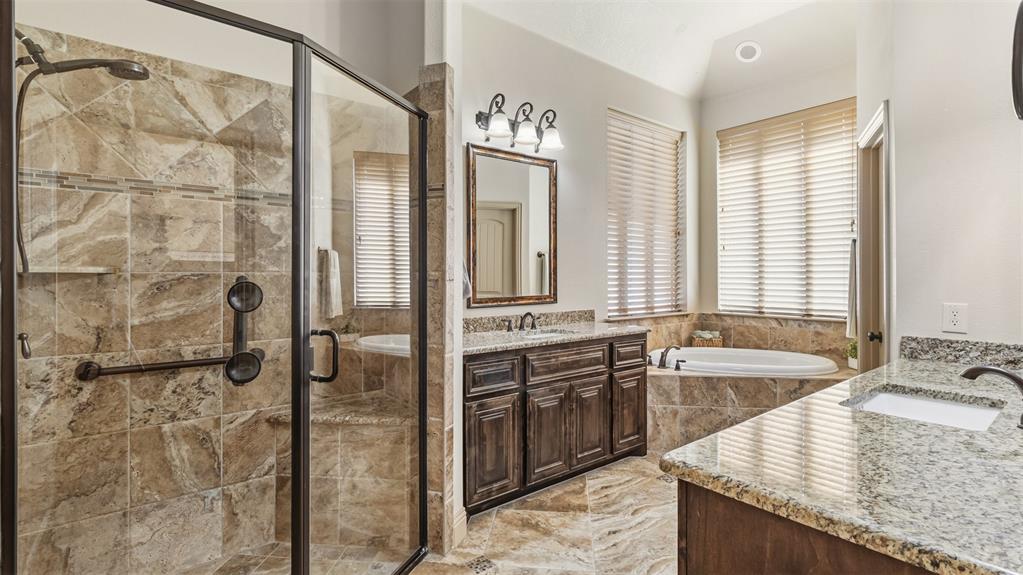 509 Alice Lane Fate, TX 75189 - Photo 15 of 36 Be sure to notice the step down pan on shower for easy entry/exit