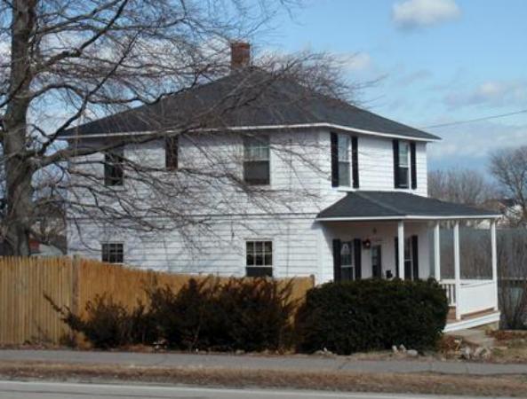 55 Marion Road Scituate, MA 02066 - Photo 12 of 16 a front view of a house with plants