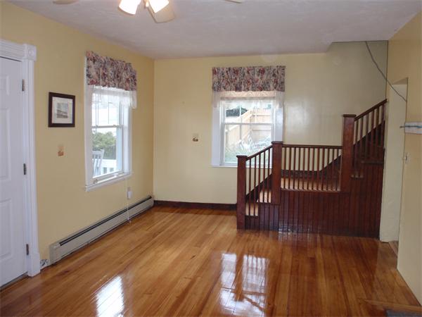 55 Marion Road Scituate, MA 02066 - Photo 5 of 16 a view of entryway with wooden floor