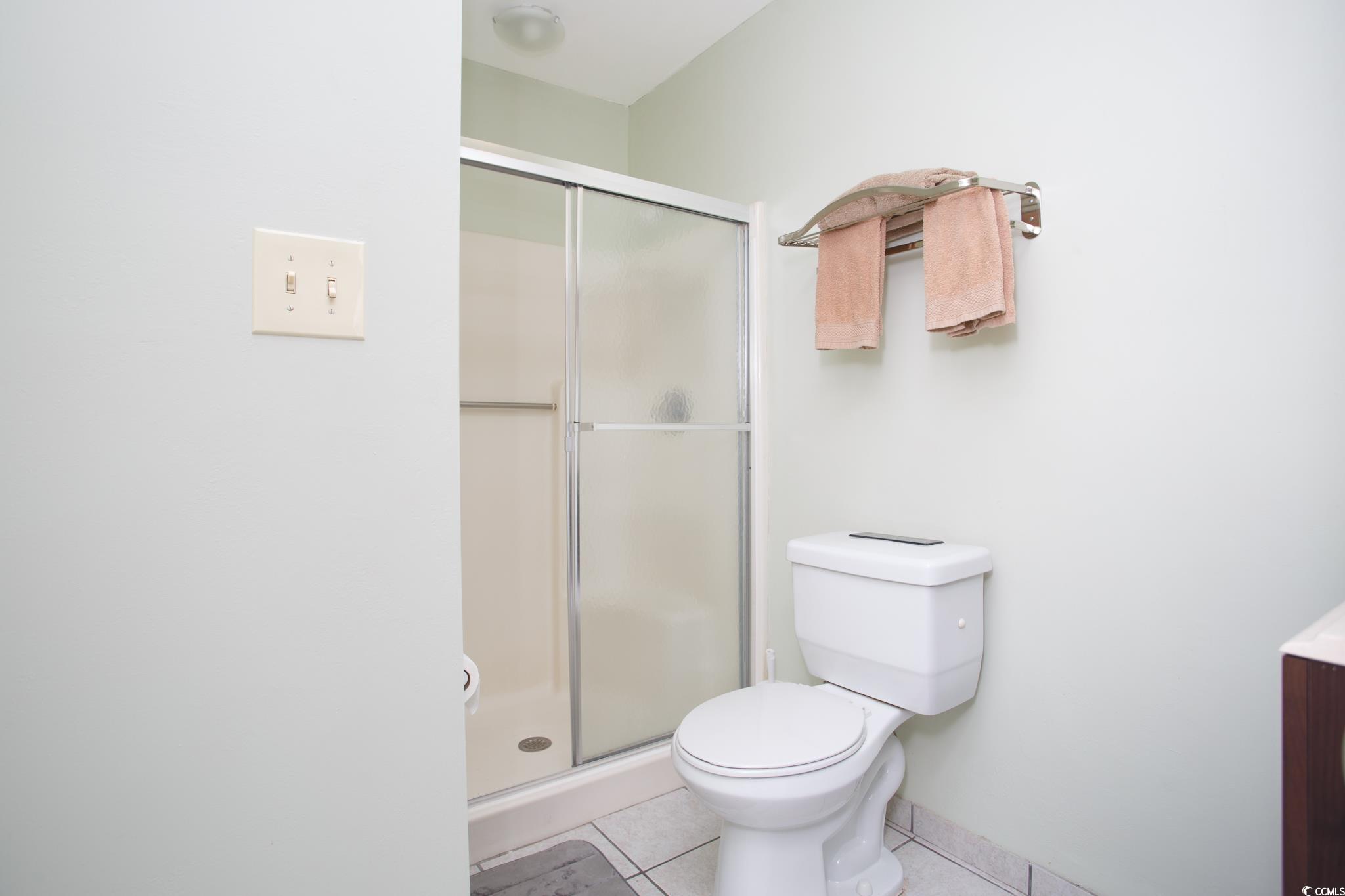 1356 Glenns Bay Road, Unit 201B Surfside Beach, SC 29575 - Photo 13 of 37 Bathroom featuring light tile patterned flooring,