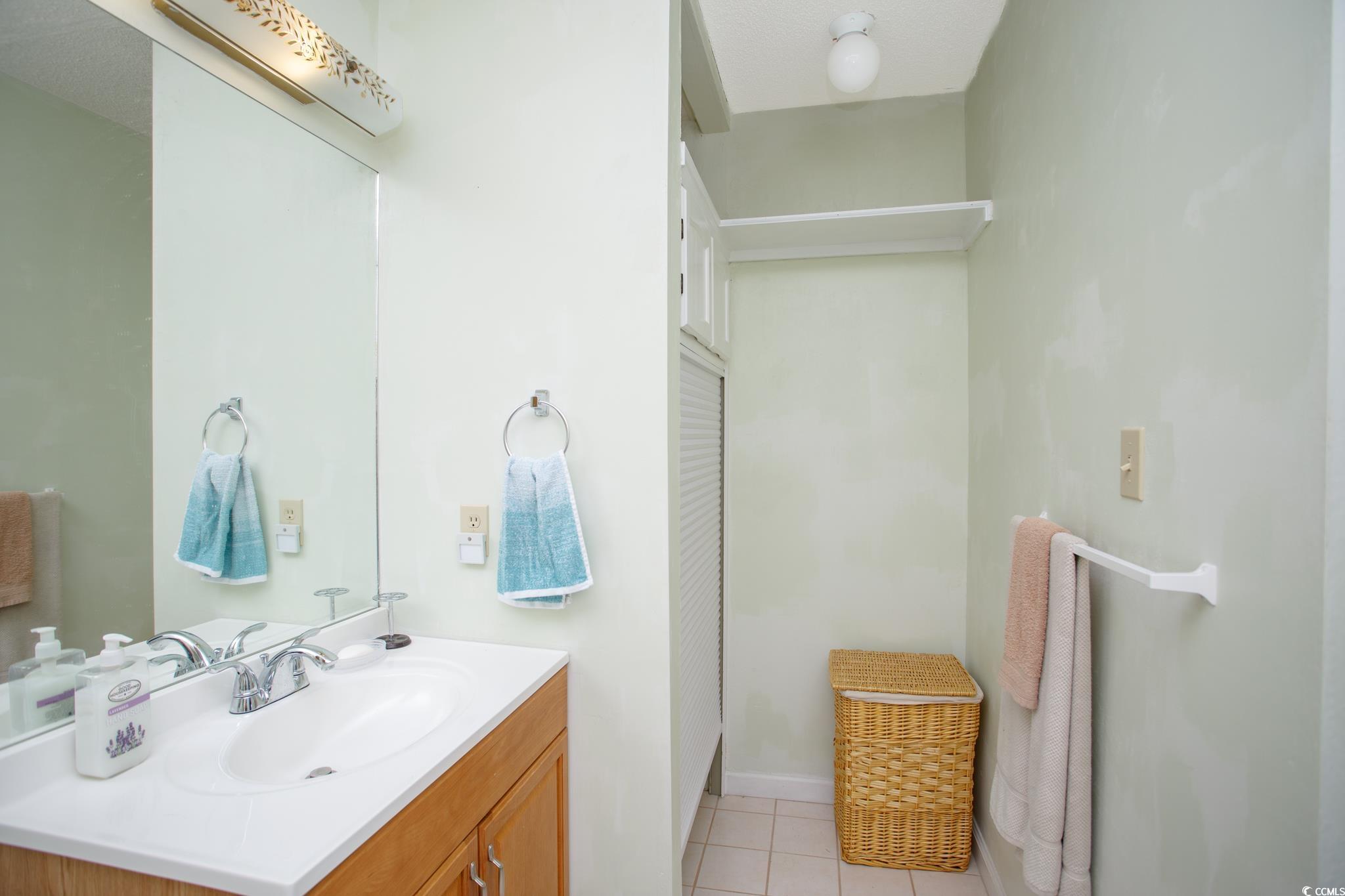 1356 Glenns Bay Road, Unit 201B Surfside Beach, SC 29575 - Photo 18 of 37 Bathroom featuring light tile patterned floors and