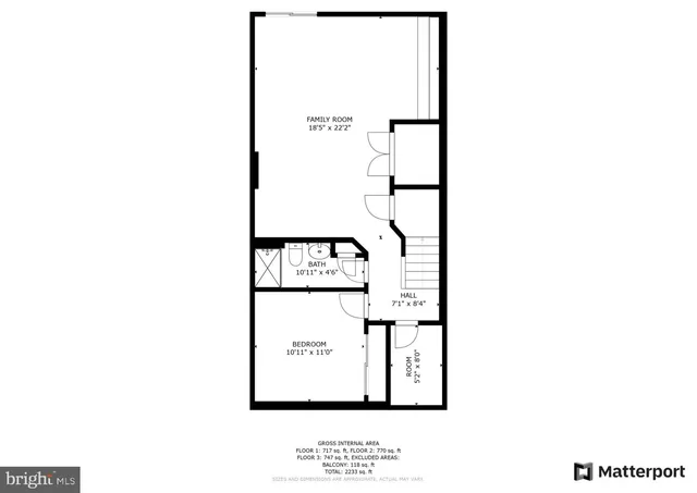 a picture of a bench in front of a wall