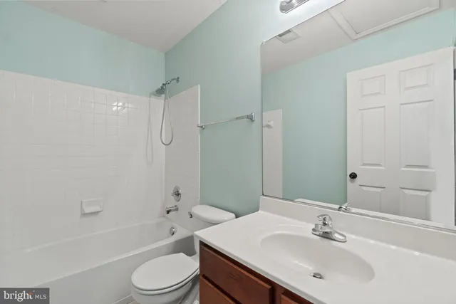 a bathroom with a sink toilet a shower and bathtub