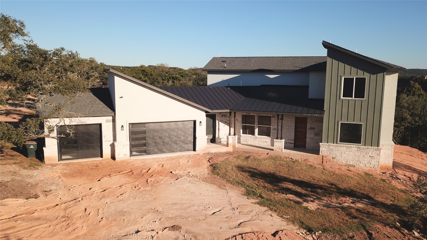 17307 West Reed Park Road Leander, TX 78645 - Photo 9 of 19 a view of a house with a snow in the yard