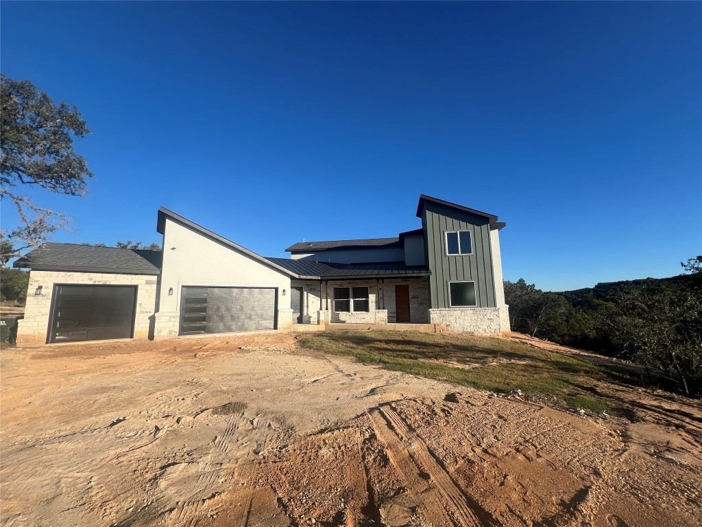 17307 West Reed Park Road Leander, TX 78645 - Photo 10 of 19 a front view of a house with a yard