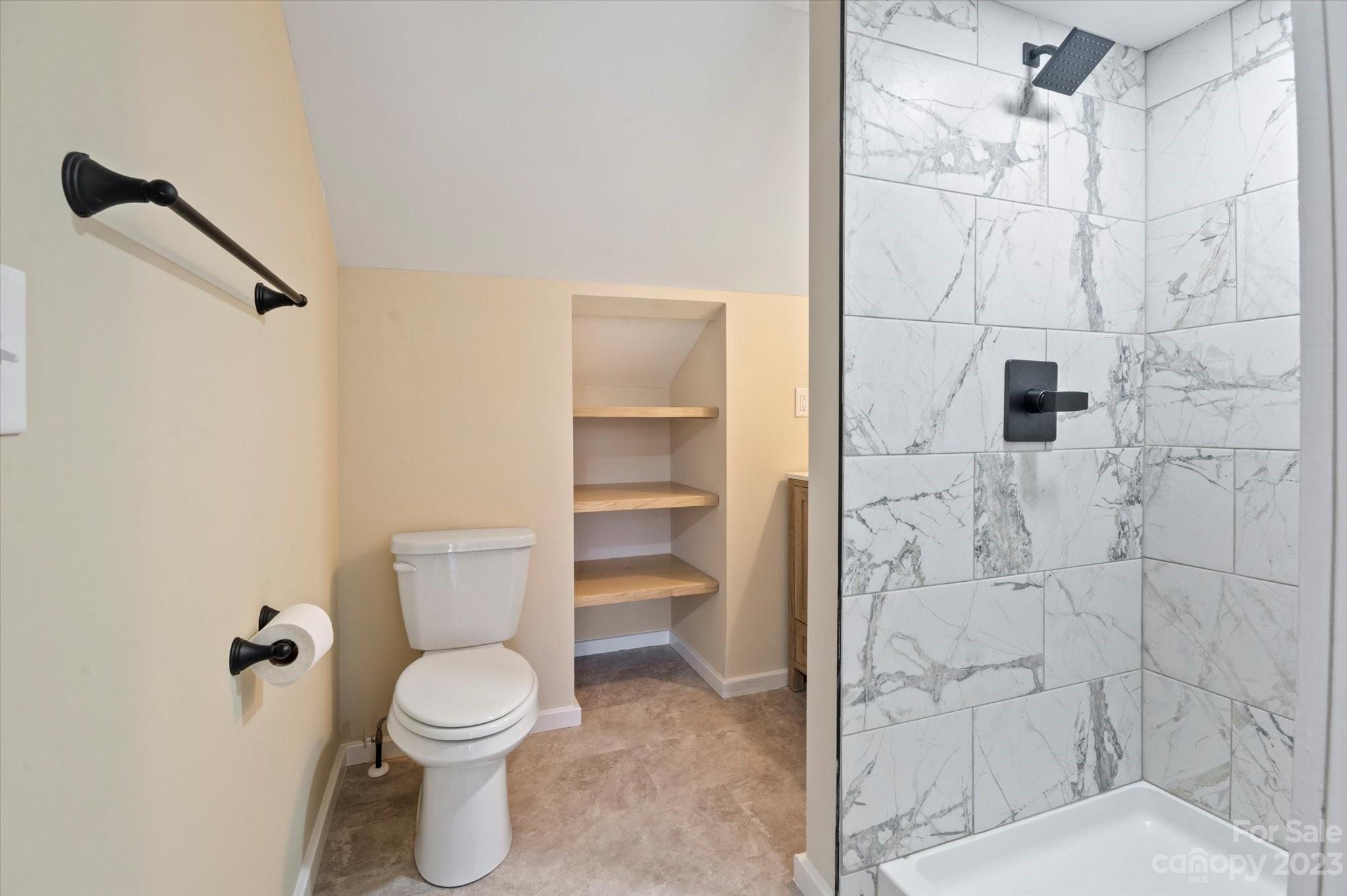 969 Peniel Road Columbus, NC 28722 - Photo 29 of 32 a bathroom with a toilet and a shower