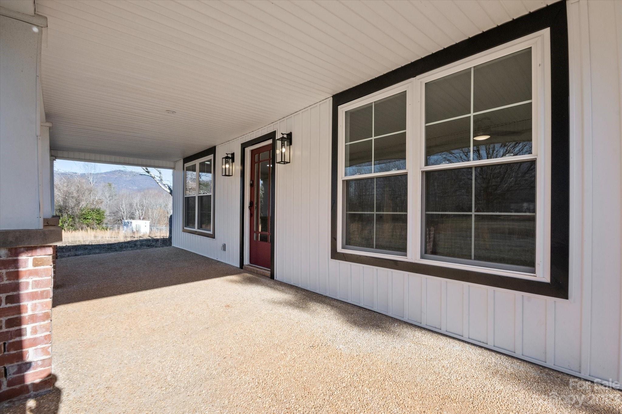 969 Peniel Road Columbus, NC 28722 - Photo 6 of 32 a view of an empty room with a window