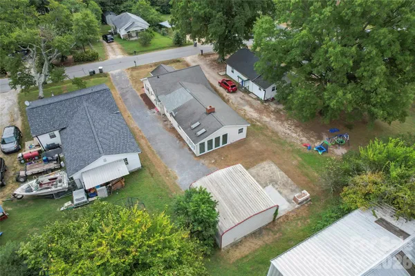 an aerial view of a house with a garden