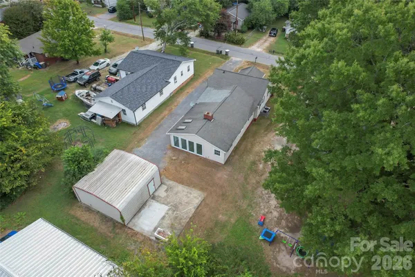 an aerial view of a house with a garden
