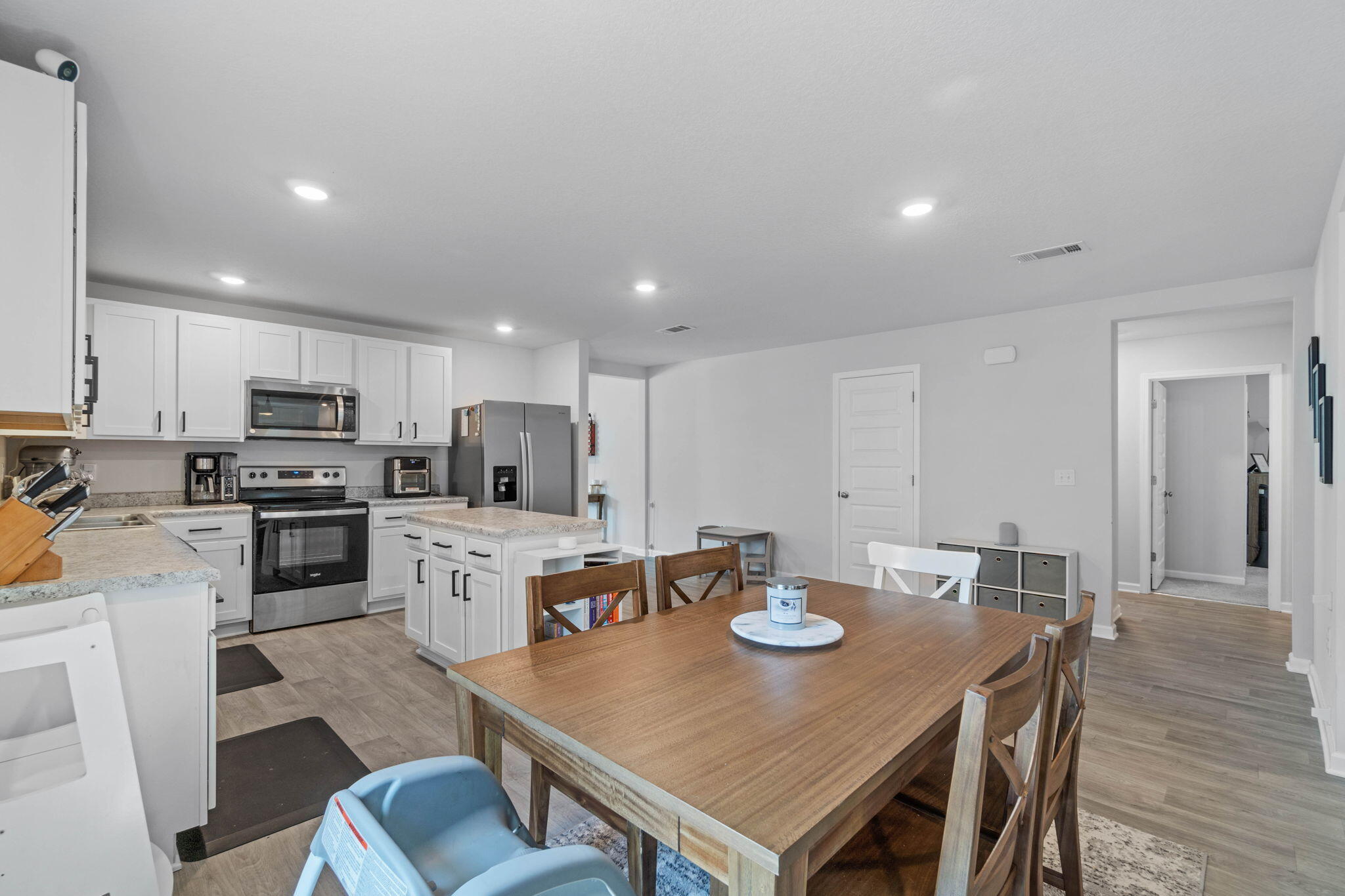 82 American Court Santa Rosa Beach, FL 32459 - Photo 12 of 47 a large kitchen with a table and chairs