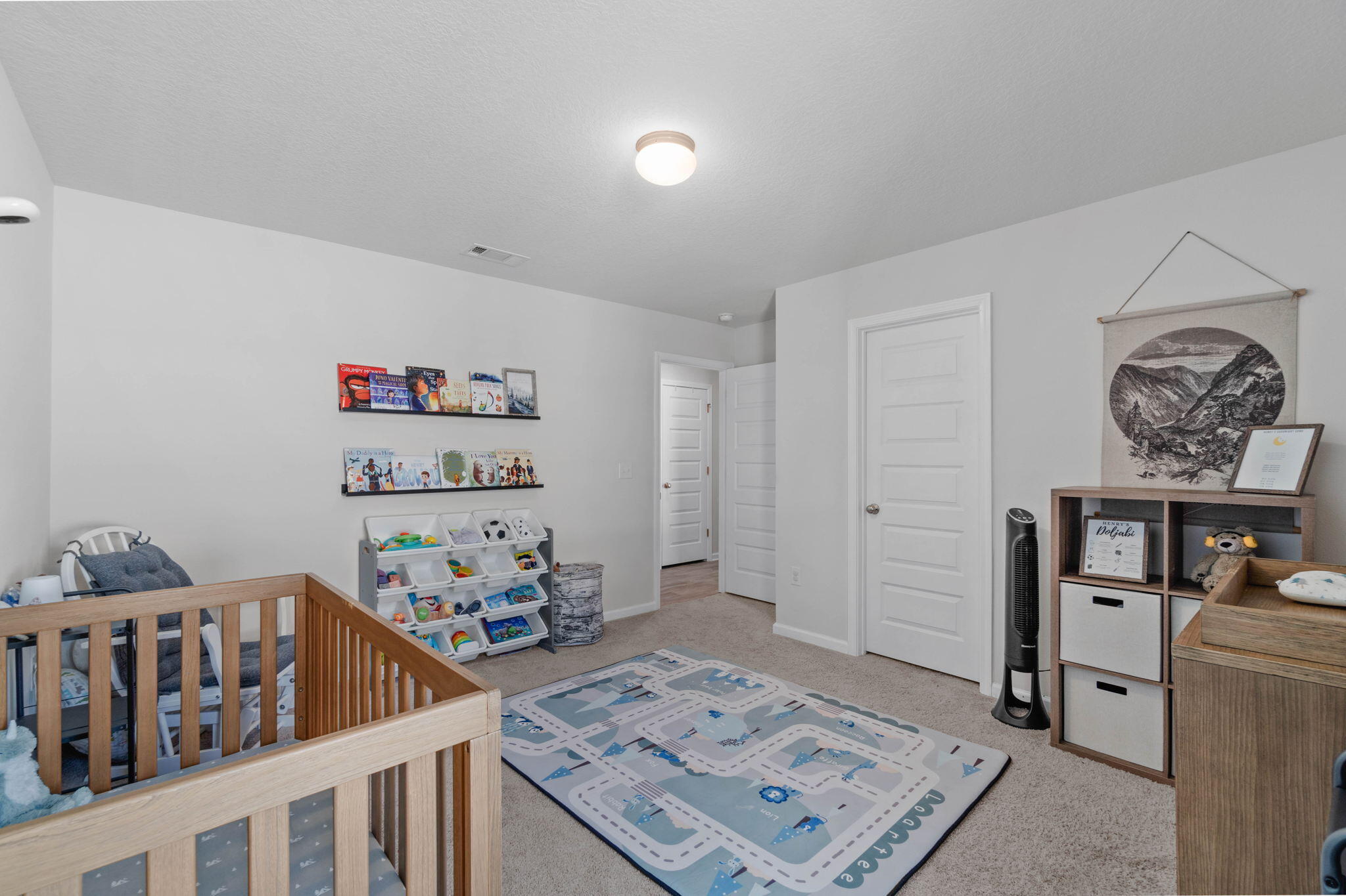 82 American Court Santa Rosa Beach, FL 32459 - Photo 33 of 47 a bedroom with furniture and wooden floor