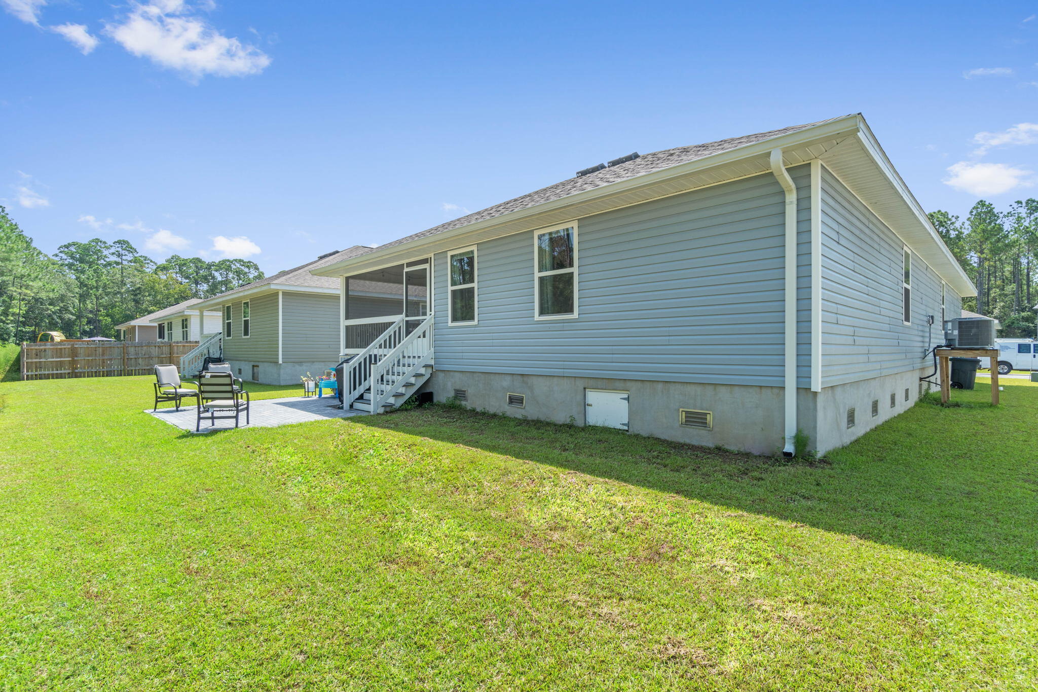 82 American Court Santa Rosa Beach, FL 32459 - Photo 38 of 47 a view of a house with backyard porch and sitting area