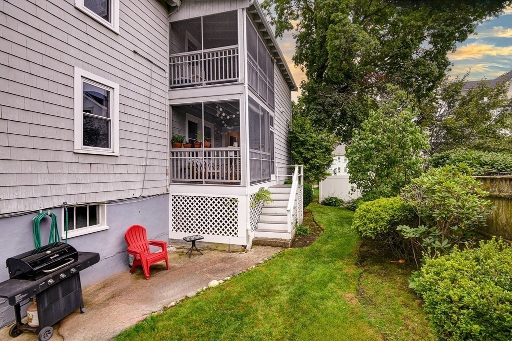 26-28 Normandy Road Auburndale, MA 02466 - Photo 3 of 31 a front view of a house with a garden