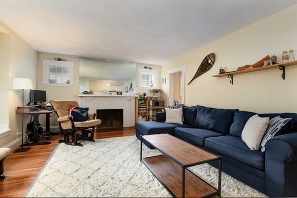 26-28 Normandy Road Auburndale, MA 02466 - Photo 6 of 31 a living room with furniture and a fireplace