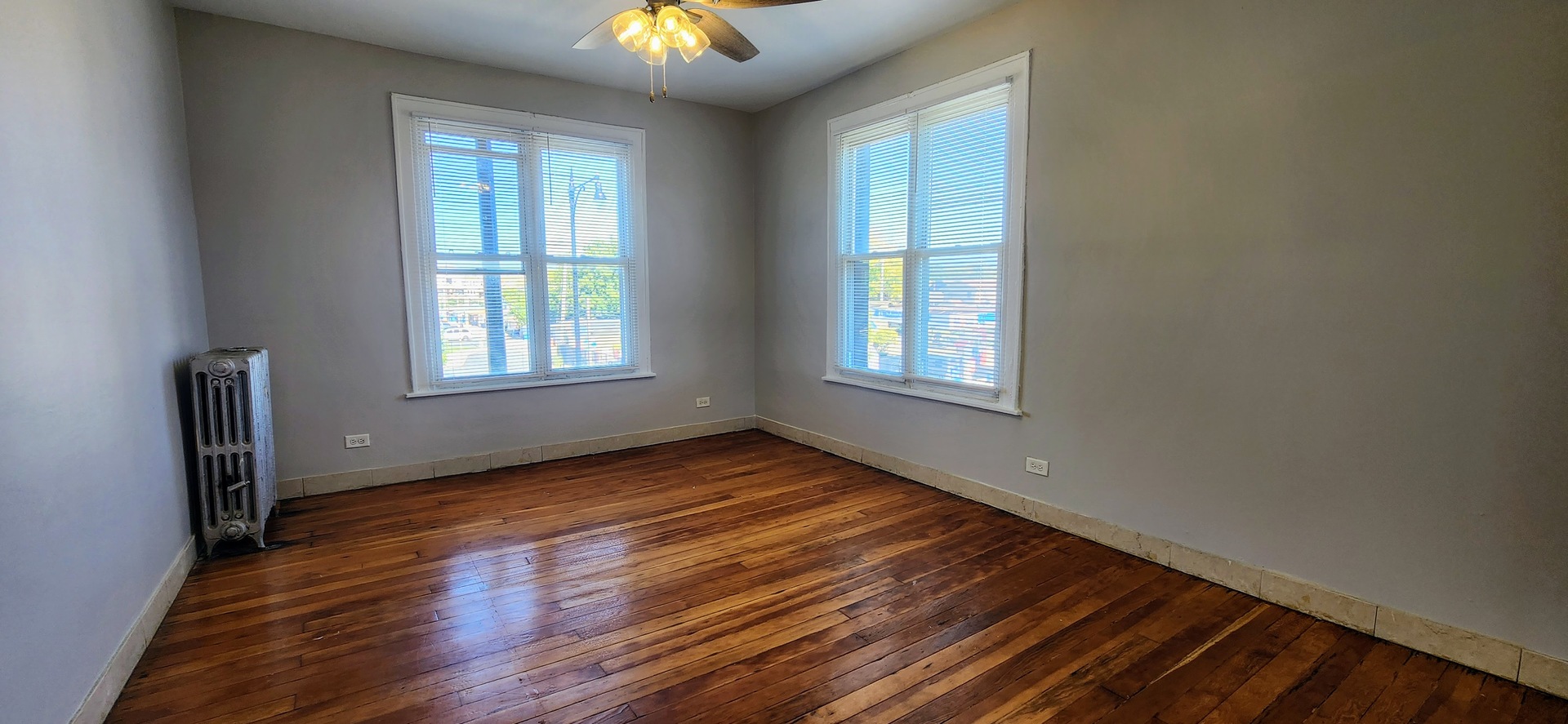4764 North Virginia Avenue, Unit 206 Chicago, IL 60625 - Photo 8 of 16 an empty room with windows