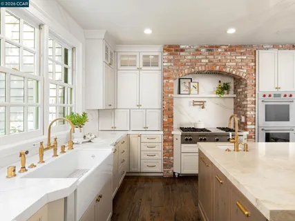 a view of a dining room with furniture and window