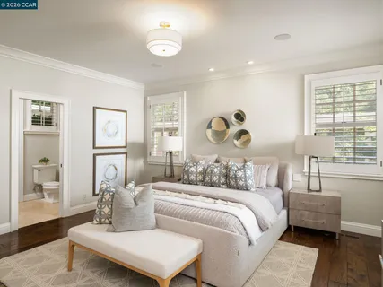 a lobby with furniture and floor to ceiling window