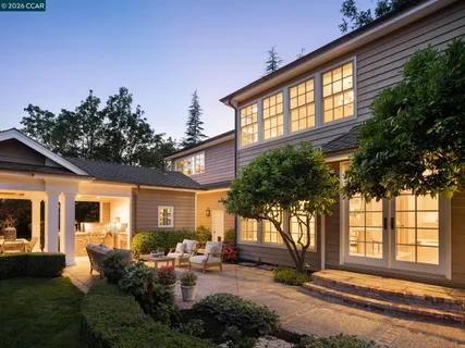 a view of a house with swimming pool