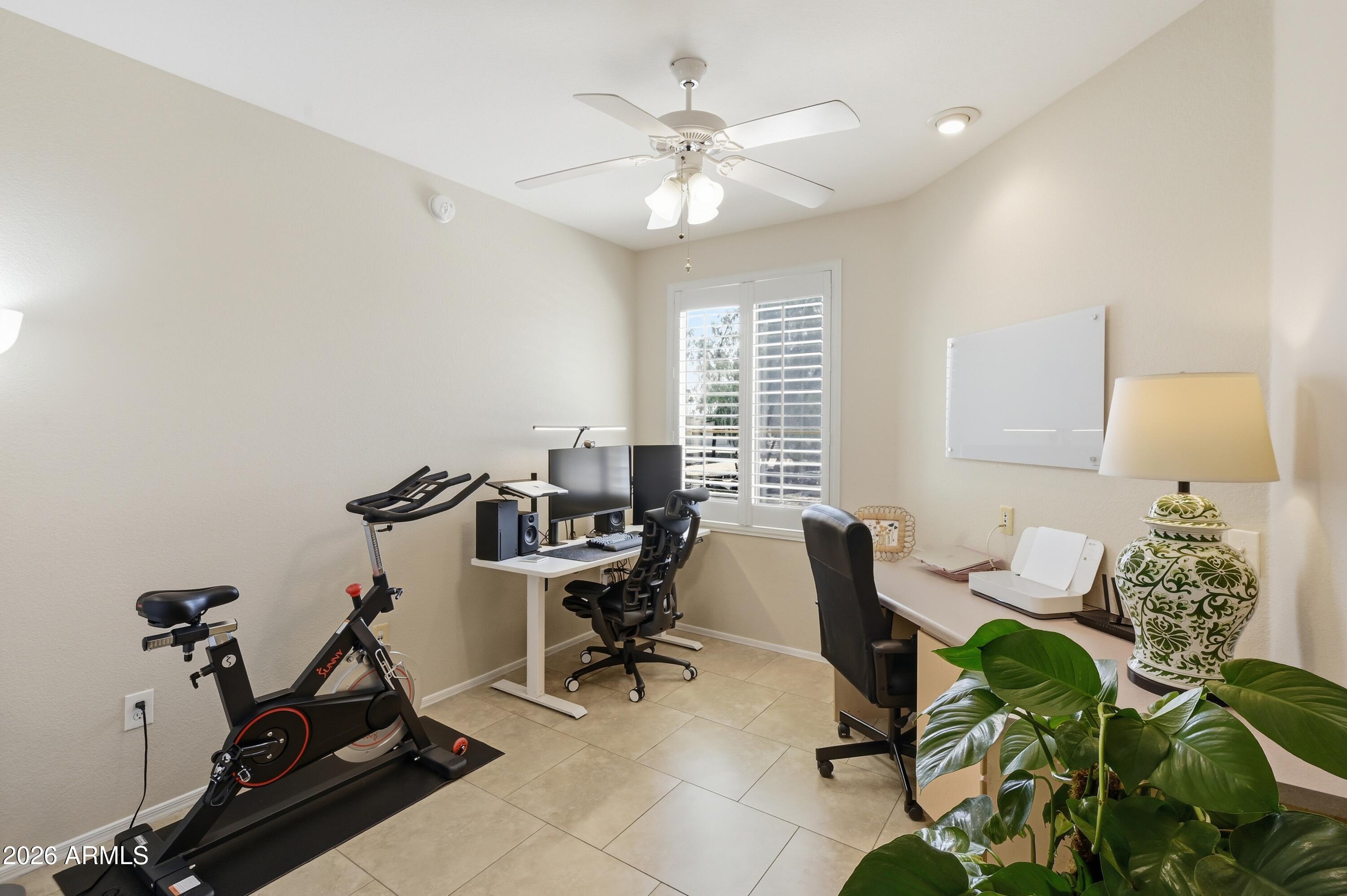 5303 North 7th Street, Unit 220 Phoenix, AZ 85014 - Photo 15 of 33 a view of a workspace with furniture and a window