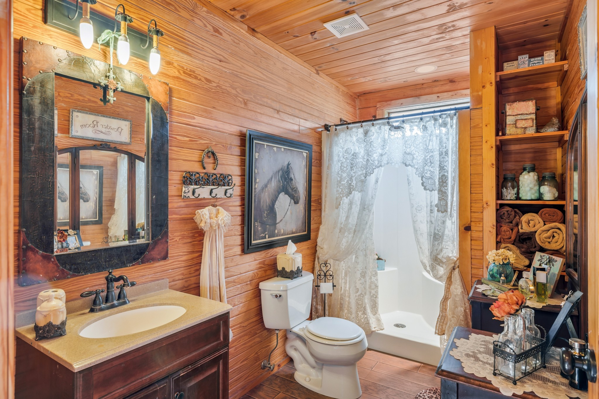 7997 Shoals Branch Road Primm Springs, TN 38476 - Photo 22 of 50 a bathroom with a sink toilet and shower