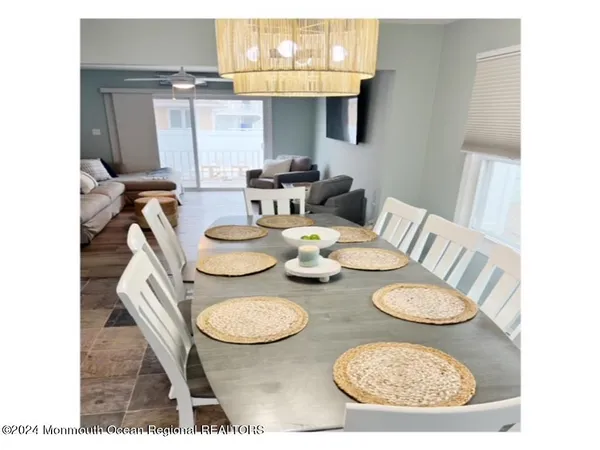 a dining room with furniture and a table
