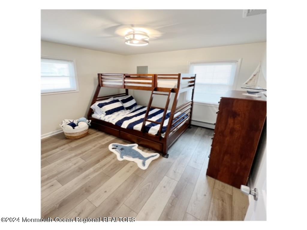 308 Harding Avenue, Unit WKLY SUMMER RENTAL Seaside Heights, NJ 08751 - Photo 16 of 25 a living room with furniture