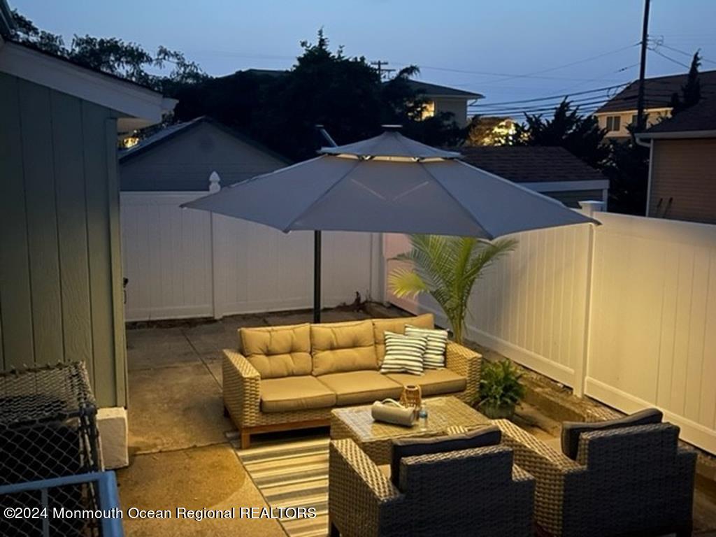 308 Harding Avenue, Unit WKLY SUMMER RENTAL Seaside Heights, NJ 08751 - Photo 25 of 25 a outdoor space with furniture