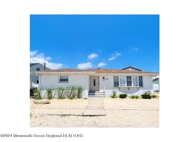 a view of a house with a swimming pool