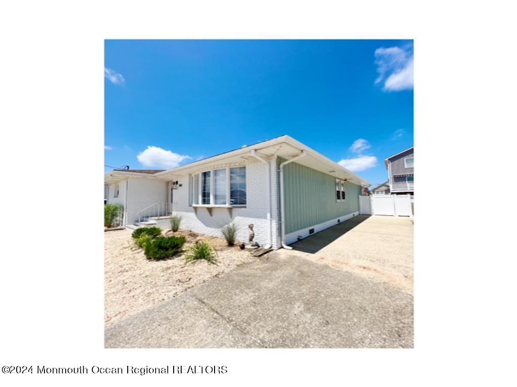 308 Harding Avenue, Unit WKLY SUMMER RENTAL Seaside Heights, NJ 08751 - Photo 4 of 25 a house view with a outdoor space