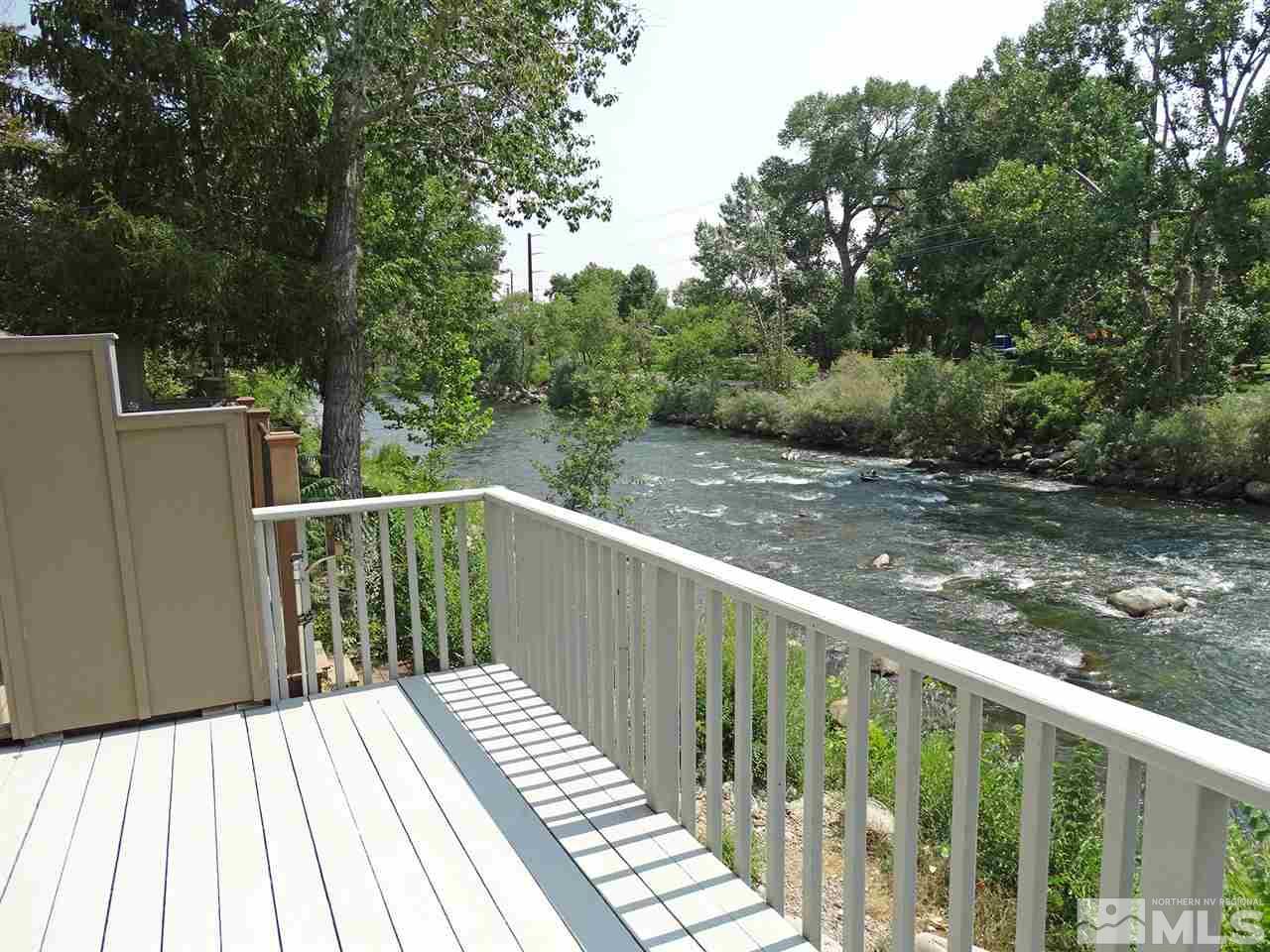 1336 Jones Street Reno, NV 89503 - Photo 11 of 24 a balcony with wooden floor and fence