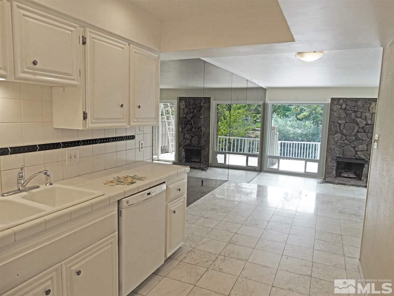 1336 Jones Street Reno, NV 89503 - Photo 10 of 24 a kitchen with a sink and cabinets