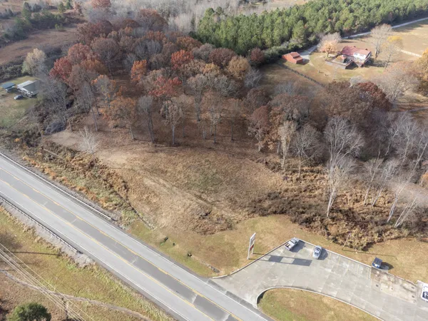 a bathroom with a granite countertop sink and vanity