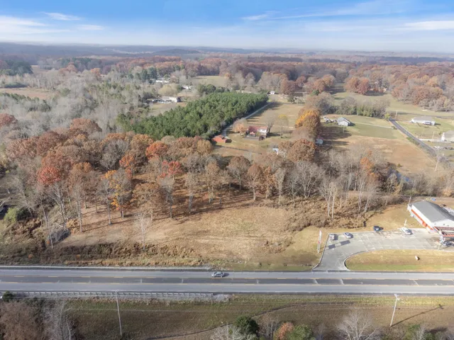 an aerial view of beach and ocean
