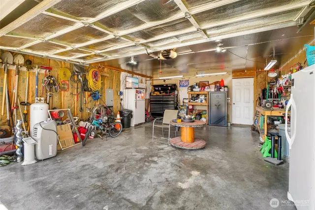 a view of a hallway with a livingroom