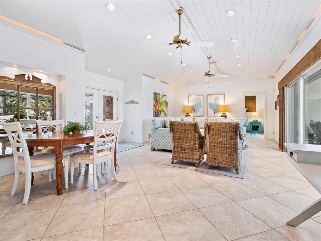 18 North Casey Key Road Osprey, FL 34229 - Photo 11 of 49 a view of a dining room with furniture