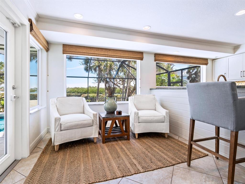 18 North Casey Key Road Osprey, FL 34229 - Photo 14 of 49 a living room with furniture and a large window