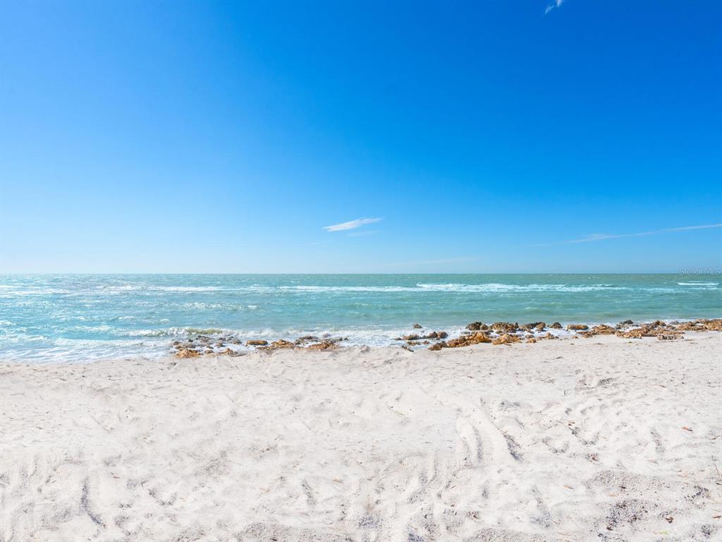 18 North Casey Key Road Osprey, FL 34229 - Photo 2 of 49 an ocean view with beach