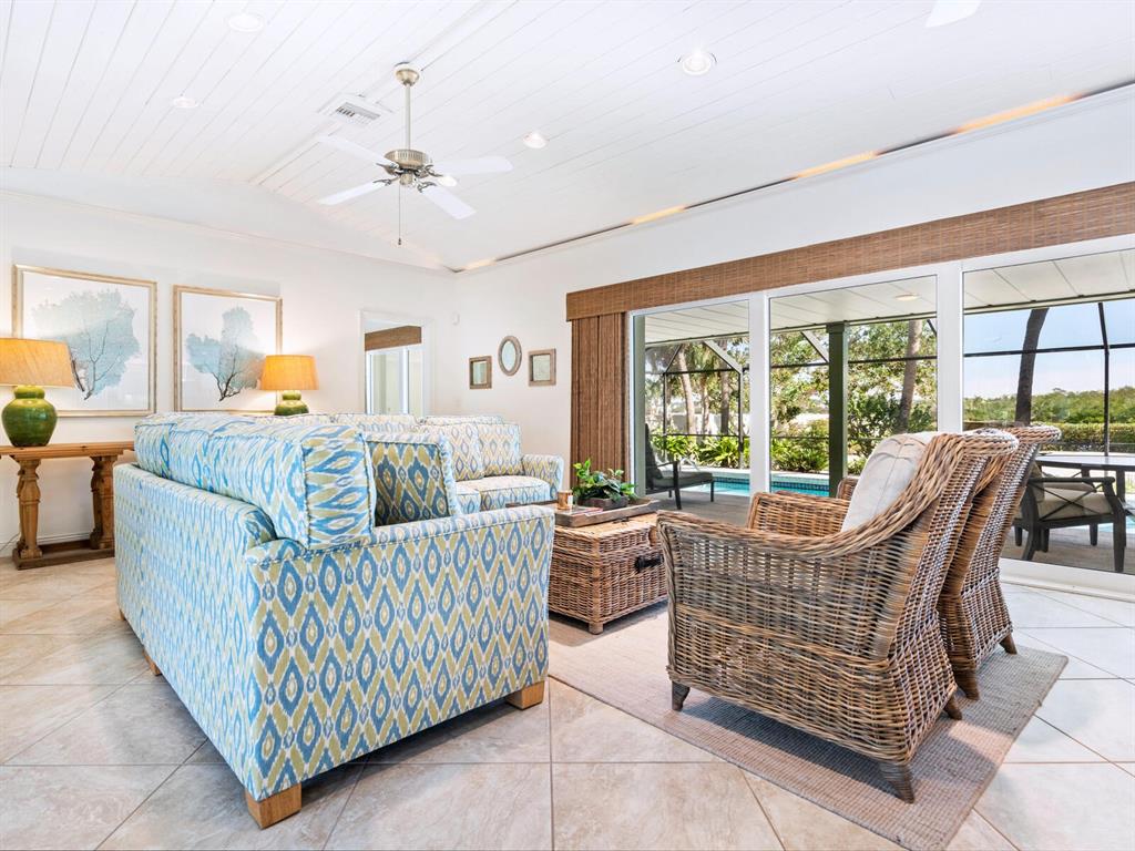 18 North Casey Key Road Osprey, FL 34229 - Photo 9 of 49 a living room with furniture and a large window