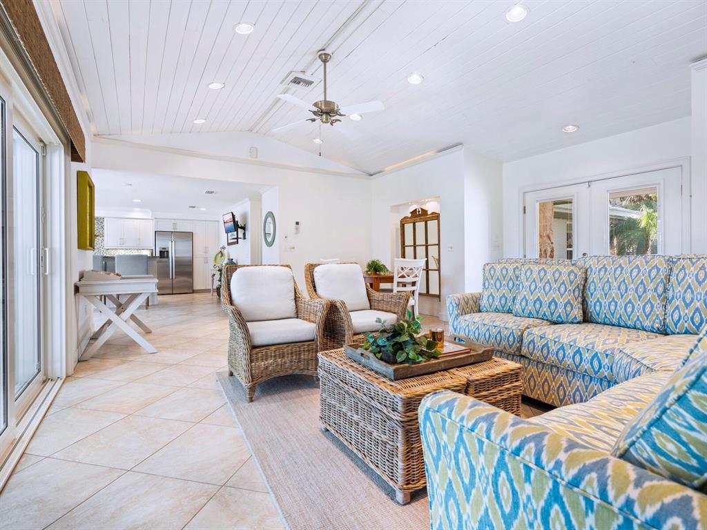 18 North Casey Key Road Osprey, FL 34229 - Photo 10 of 49 a living room with furniture and a couch