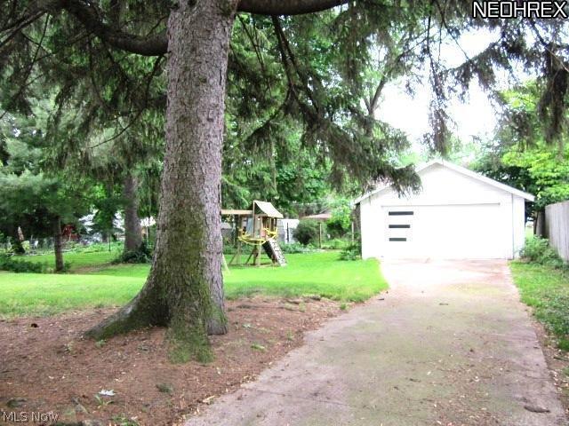 1238 North Main Street Akron, OH 44310 - Photo 4 of 19 The backyard, driveway and 2 car garage