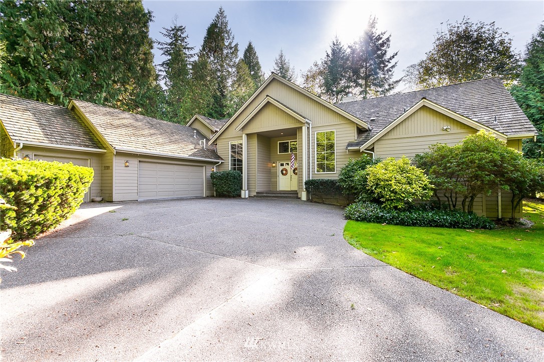 5520 Canvasback Road Blaine, WA 98230 - Photo 1 of 31 a view of a house with a yard and potted plants