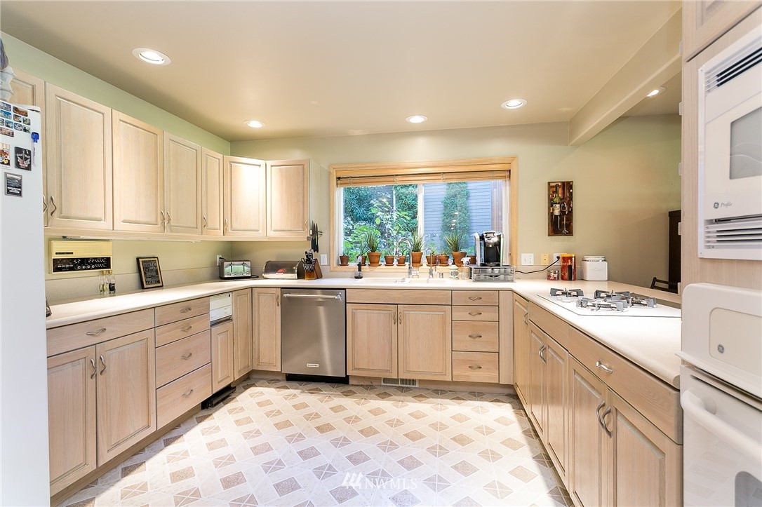 5520 Canvasback Road Blaine, WA 98230 - Photo 12 of 31 a kitchen with a sink and cabinets