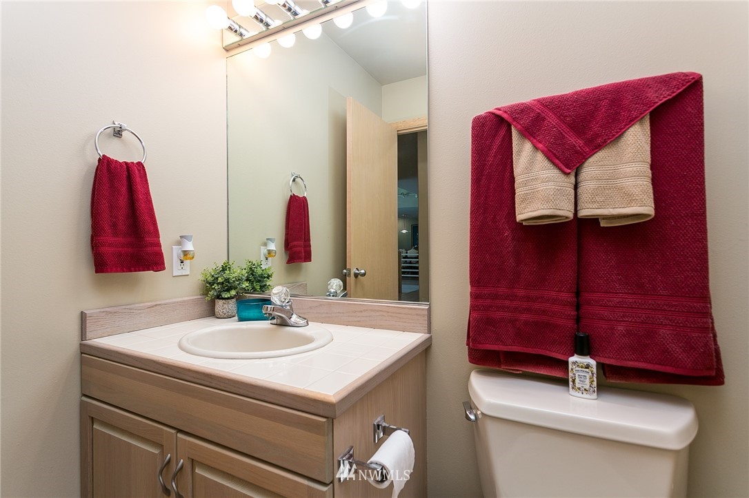 5520 Canvasback Road Blaine, WA 98230 - Photo 20 of 31 a bathroom with a sink and a mirror