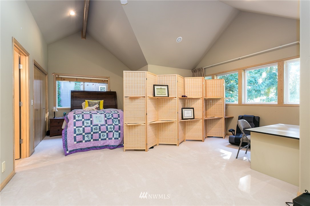 5520 Canvasback Road Blaine, WA 98230 - Photo 22 of 31 a bedroom with furniture and a large window