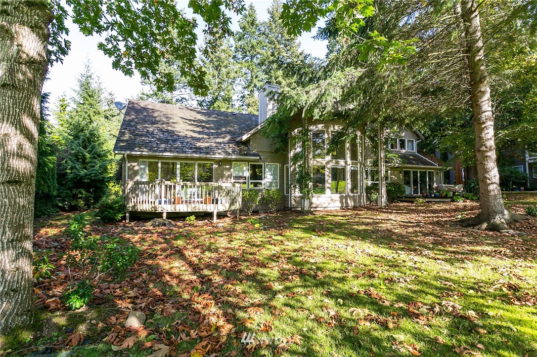 5520 Canvasback Road Blaine, WA 98230 - Photo 29 of 31 a view of a house with backyard and sitting area