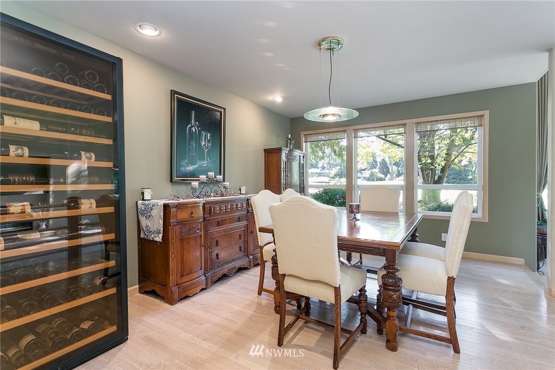 5520 Canvasback Road Blaine, WA 98230 - Photo 5 of 31 a view of a dining room with furniture window and wooden floor