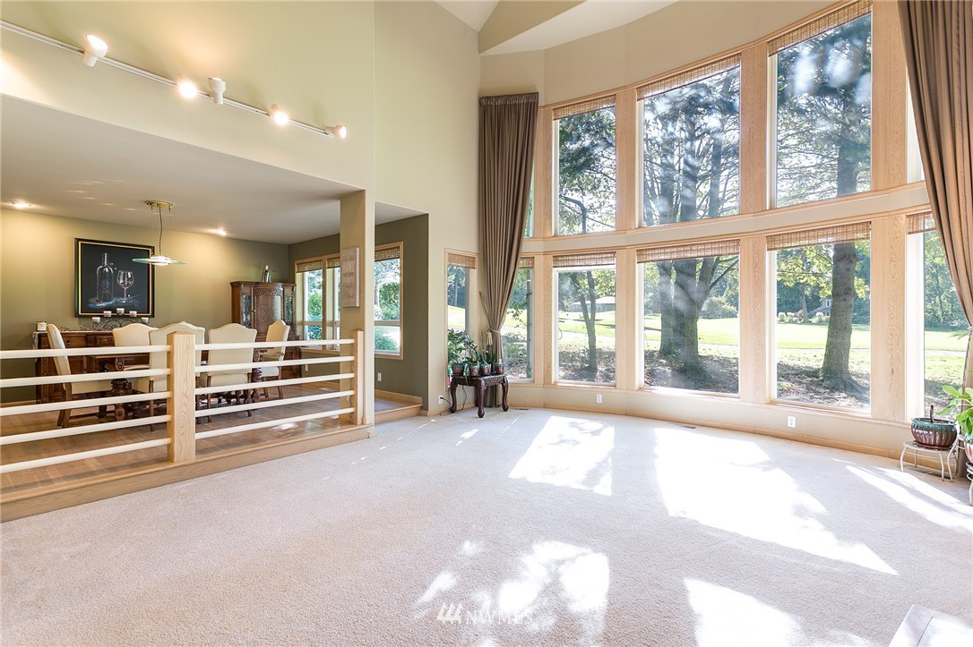 5520 Canvasback Road Blaine, WA 98230 - Photo 7 of 31 a view of a big room with large windows