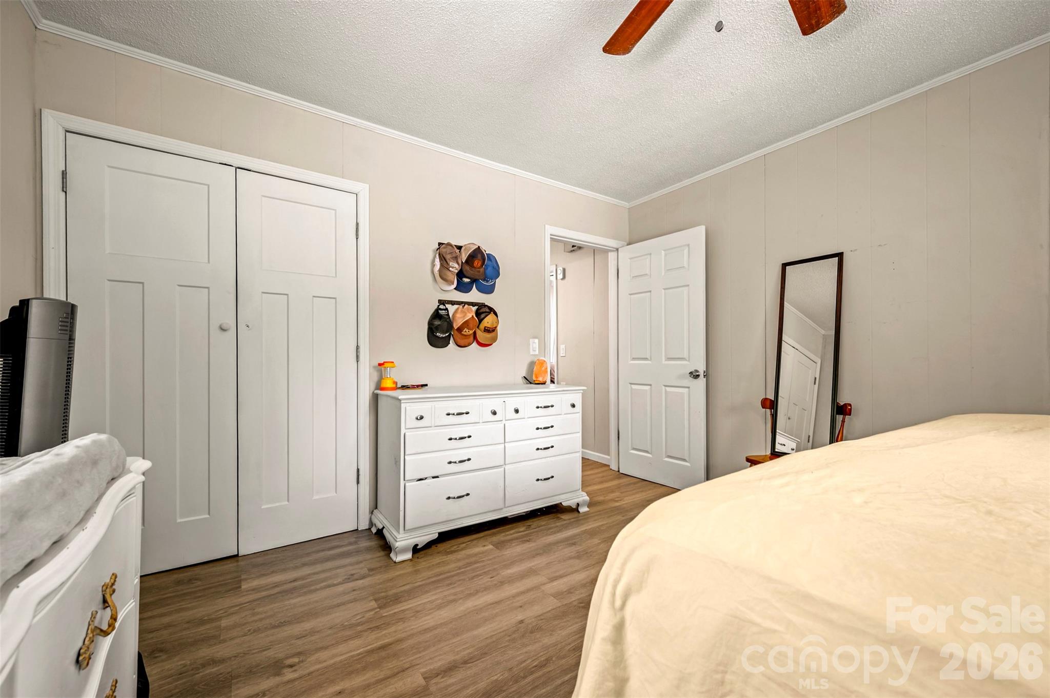 1685 Lynn Road Columbus, NC 28722 - Photo 14 of 31 a bedroom with a bed and a dresser